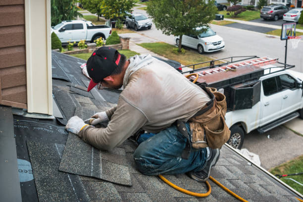 Professional Emergency Roof Repair technician working in Lake Cicott, IN